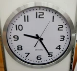 New 16" Aluminum Finish White Dial Wall Clock Item # Fs 25513W. Price: $34.99.